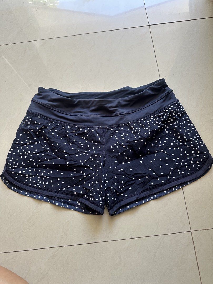 Lululemon groovy run shorts dot 6 (Category: Activewear) located in Rosales. Submitted by dariang22 (Listing ID 1463969340, Image 3). Description: - Navy blue Lululemon running shorts - White polka dot pattern - Comfortable waistband - Zippered pocket at the back - Lululemon logo on the side - Lightweight and breathable material - Ideal for workouts or casual wear.