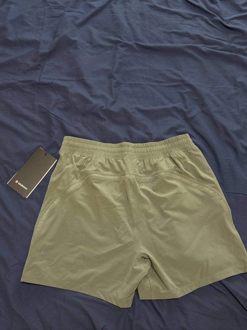 Lululemon Pace Breaker Short 5" Green (Category: Shorts) located in Quezon City. Submitted by see_14 (Listing ID 1464015145, Image 1). Description: - Lululemon Pace Breaker Shorts - Size: M - Length: 5-inch inseam - Fabric: Swift (4-way stretch, sweat-wicking, quick-drying) - Features: Grid mesh inner waistband, hand pockets with hidden phone/coin sleeves, low-bounce zippered side pocket - Fit: Classic fit.