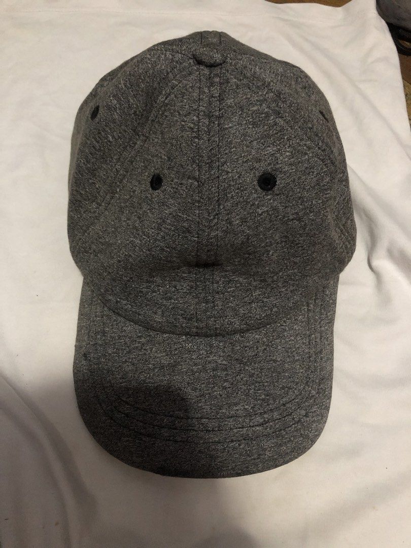 Lululemon running cap (Category: Caps & Hats) located in Manila. Submitted by dendenboomshakala (Listing ID 1463978430, Image 1). Description: - Grey melange baseball cap - Adjustable strap at the back for a custom fit - Simple and classic design - Perfect for everyday wear - Small metal detail on the side.