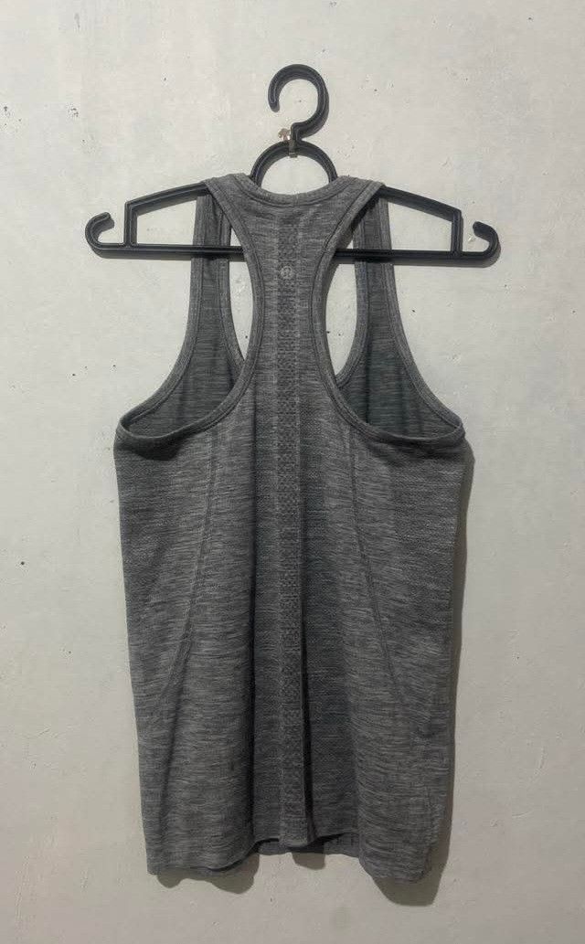Lululemon Swiftly Tech Tanktop (Category: Activewear) located in Meycauayan. Submitted by epicforest_231b9d (Listing ID 1463989832, Image 3). Description: - Lululemon Swiftly Tech Tanktop - Size: DOT 6 - Ideal for running and workouts - Features breathable fabric and racerback design - Price: P350.