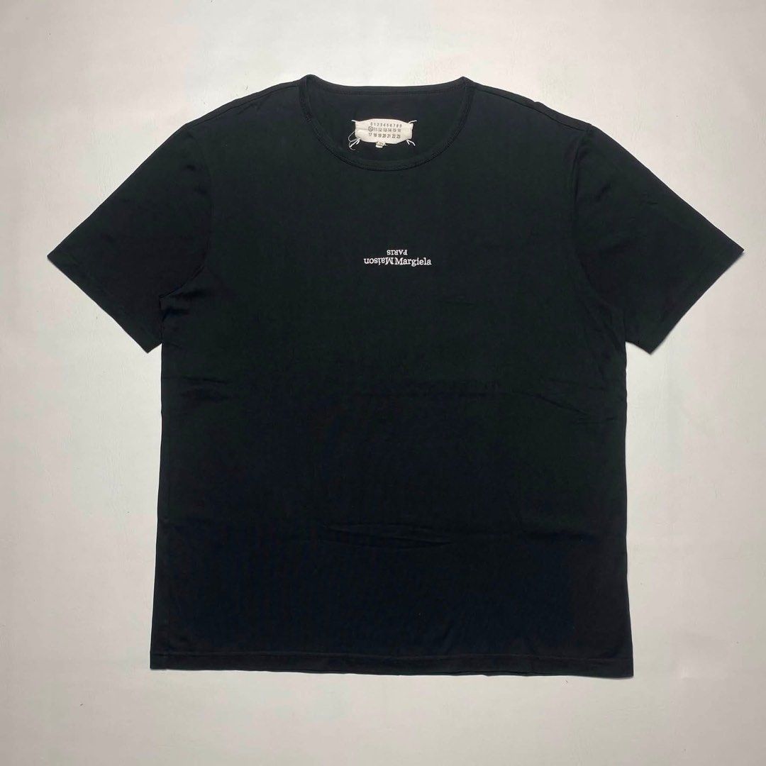 MAISON MARGIELA DISTORTED LOGO TEE (Category: Shirts) located in San Fernando. Submitted by upwear.ph (Listing ID 1464063128, Image 1). Description: MAISON MARGIELA DISTORTED LOGO TEE CONDITION : EXCELLENT SIZE : LARGE DIMENSIONS: W23 x L28 ISSUE: NONE .
