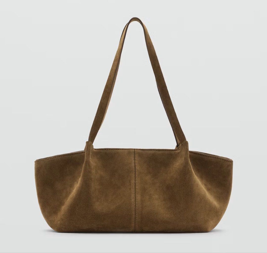 Mango Leather & Suede Bag (Category: Shoulder Bags) located in Makati City. Submitted by sabmi (Listing ID 1463941412, Image 1). Description: - 100% bovine leather & Suede - double shoulder strap - Zip fastening - Decorative seams - Inner lining Original price: ₱10,995 39.0x17.0x15.0 cm (Length x Height x Width).