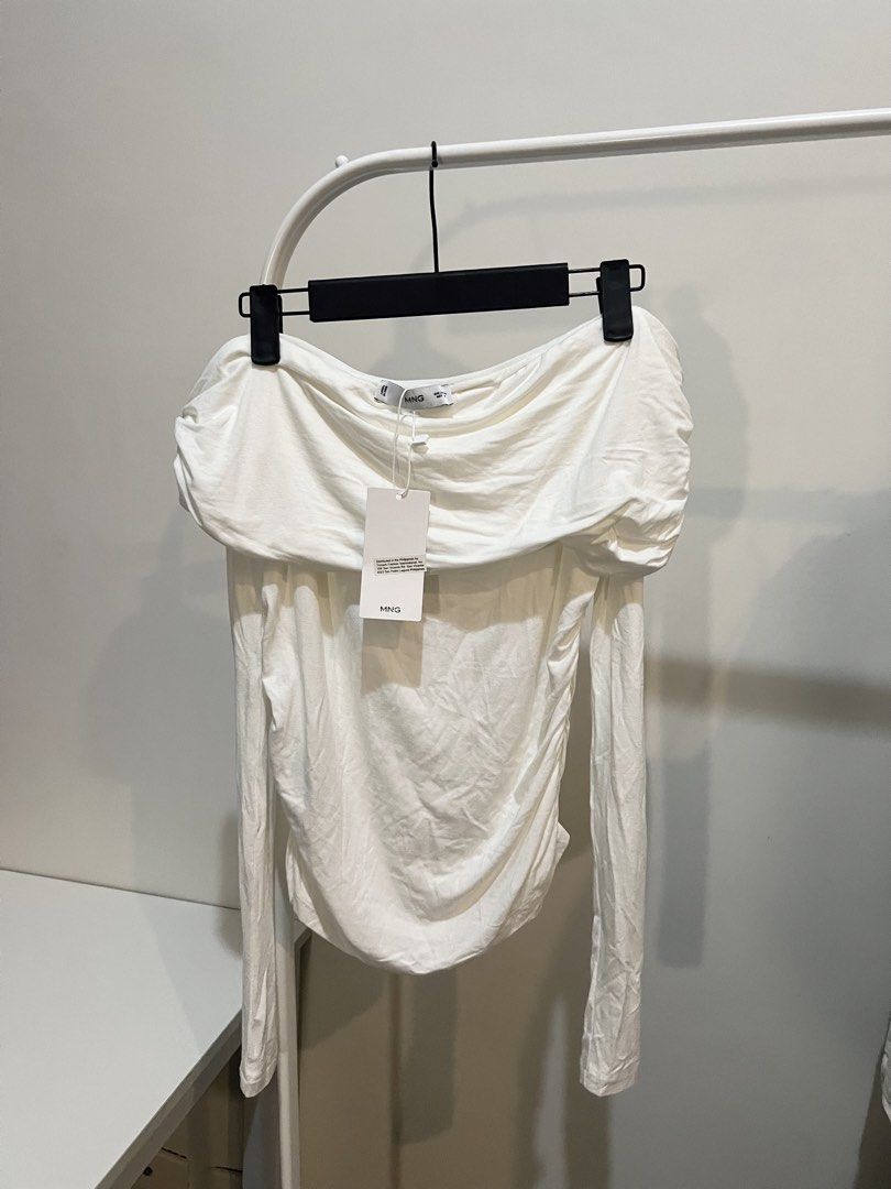 Mango White Off-Shoulder Ruched Long Sleeve Top (Category: Longsleeves) located in Quezon City. Submitted by styleandcomfort (Listing ID 1464042262, Image 1). Description: Never worn Store bought Selling low! Message me for inquiries 😊.