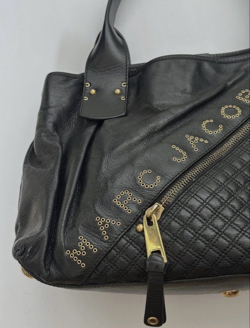 marc jacobs “irina” quilted and studded shoulder bag (Category: Shoulder Bags) located in Muntinlupa City. Submitted by leejaehyunow (Listing ID 1464101124, Image 2). Description: palugi sale. bought this for over ₱6,000. perfect for chic girls with office jobs. uses a magnetic closure. features a chunky zipper puller, studs, and a quilted pattern. loved her. rfs: too many black bags!.