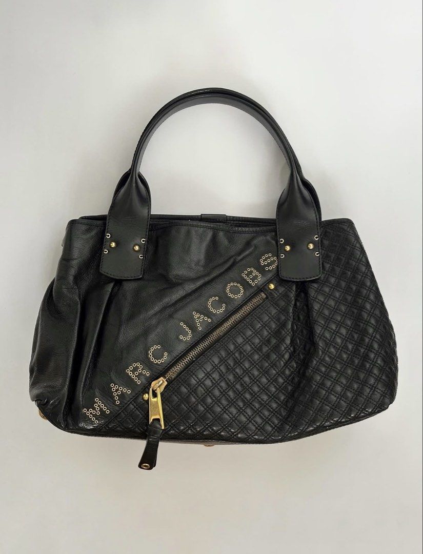 marc jacobs “irina” quilted and studded shoulder bag (Category: Shoulder Bags) located in Muntinlupa City. Submitted by leejaehyunow (Listing ID 1464101124, Image 1). Description: palugi sale. bought this for over ₱6,000. perfect for chic girls with office jobs. uses a magnetic closure. features a chunky zipper puller, studs, and a quilted pattern. loved her. rfs: too many black bags!.