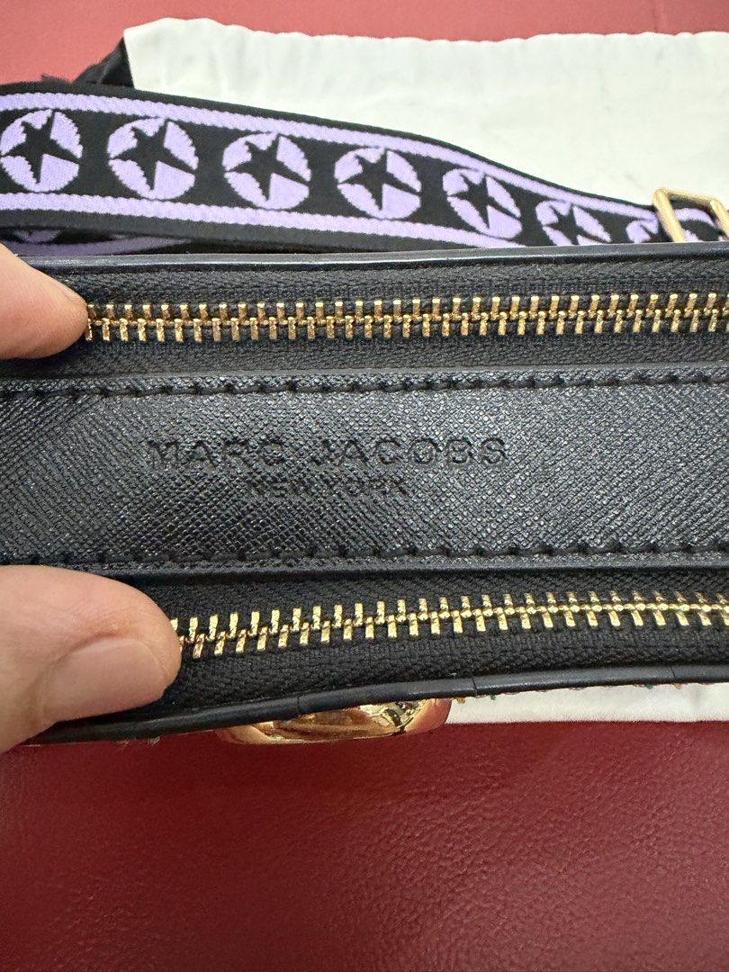 Marc Jacobs Snapshot Belt Bag (Category: Purses & Pouches) located in Cagayan de Oro. Submitted by decluttergoddess (Listing ID 1464060651, Image 3). Description: MARC JACOBS SNAPSHOT BELT BAG 🖤💗💚 ₱5,500 Iconic Marc Jacobs Snapshot Belt Bag in a unique Black / Baby Pink / Green colorway. ✨ Compact, stylish and perfect for hands-free everyday wear. DETAILS: • Marc Jacobs Snapshot Belt Bag / Waist Bag • Black, baby pink & green colorway • Saffia