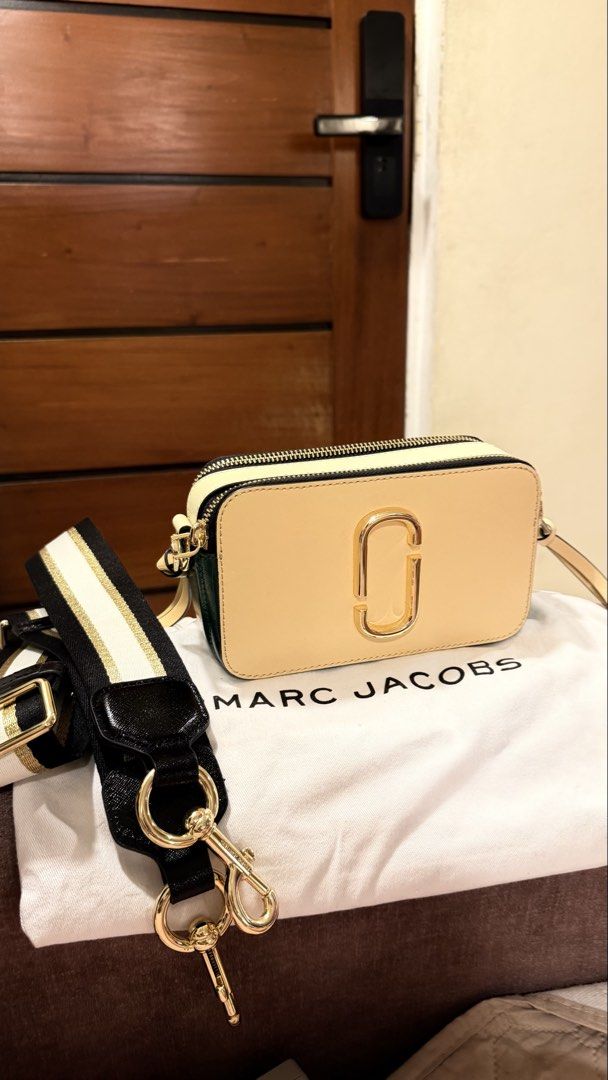 Marc Jacobs Snapshot Camera Bag (Category: Cross-body Bags) located in San Fernando. Submitted by patmalonzo (Listing ID 1463993938, Image 1). Description: Original MJ Snapshot 9/10 condition Comes with dustbag and care card With minimal hairline scratches (please see photos) .