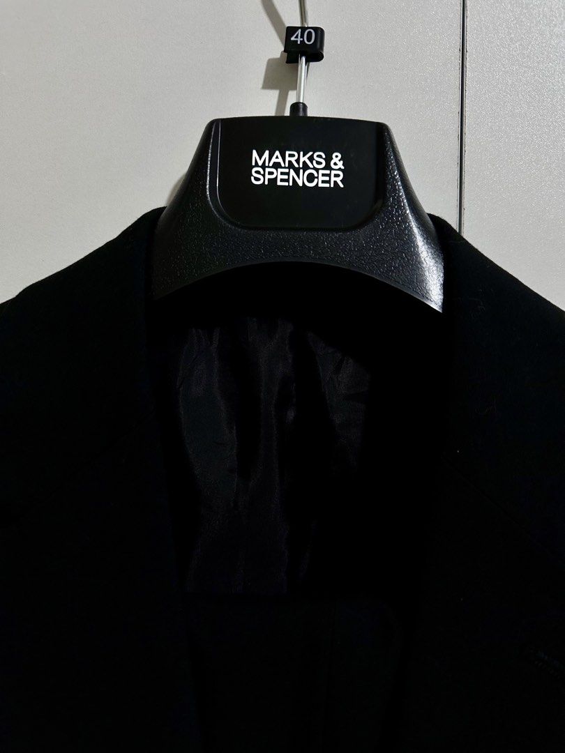 Marks & Spencer Black Tailoring Suit Set (Category: Formal Shirts) located in Cagayan de Oro. Submitted by divinephoenix (Listing ID 1464023704, Image 2). Description: - Brand: Marks & Spencer - Medium to Large - Black Suit Set (Jacket & Trousers) - Collection: Tailoring - Jacket Features: button closure, four-button cuffs, 3-inner pockets, 2-outer pockets - Trousers Fit: Classic fit size 32 waist - Occasion: Formal events, business wear - Condit