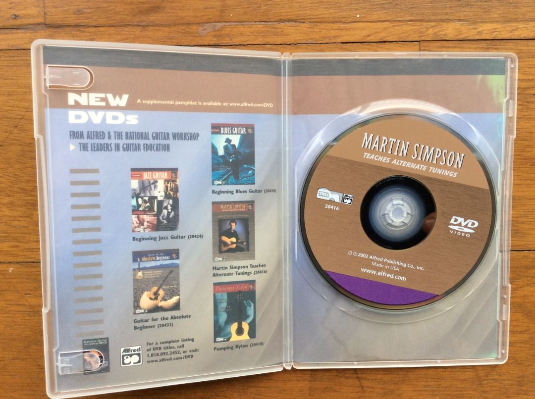 Martin Simpson Teaches Alternate Tunings DVD (Category: CDs & DVDs) located in Silang. Submitted by lawrencenorthey (Listing ID 1463950566, Image 3). Description: - Master alternate guitar tunings with Martin Simpson. - Systematic approach to open and altered tunings. - Learn chord forms and see performances. - Features pieces by rock artists. - Includes diagrams and standard music notation. - Perfect for guitarists wanting to expand their skills