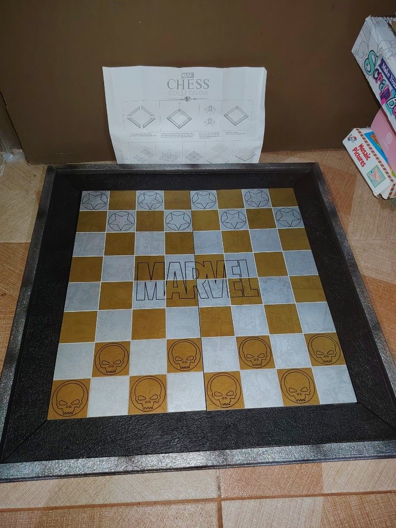 Marvel Eaglemoss Chess Collection 3D Chess Board (Category: Board Games & Puzzles) located in Santiago. Submitted by aceheart0118672 (Listing ID 1464062382, Image 1). Description: - Unique Marvel Chess Board - Features Marvel logo in the center - Skull designs on outer squares - All assembly parts and instructions included - Ideal for Marvel fans and chess enthusiasts - A great addition to any collection.