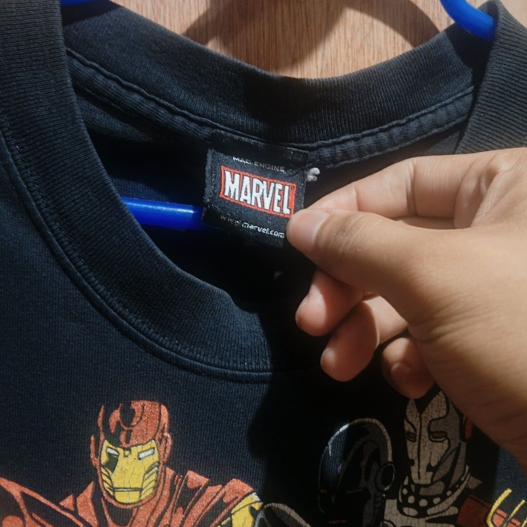 Marvel Mad Engine Iron Man T-Shirt (Category: Tshirts & Polo Shirts ) located in Manila. Submitted by silentstone.4b0628 (Listing ID 1463968017, Image 3). Description: - Official Marvel product - Cool Iron Man graphic print featuring multiple suits and Tony Stark - Size: Small (S) - Ideal for any Marvel or Iron Man fan.