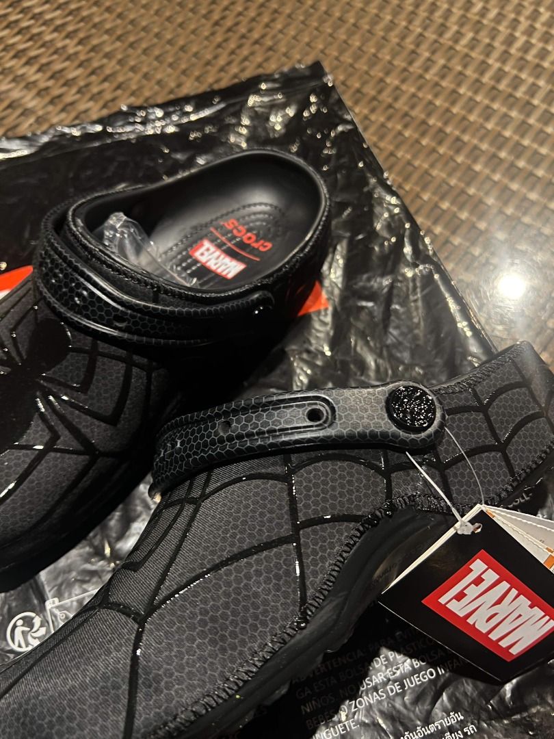 Marvel Spider-Man Neo Crocs (Category: Slippers & Slides) located in Caloocan City. Submitted by batsarjay (Listing ID 1464092646, Image 3). Description: - Black & Red Spider-Man Crocs - Features iconic spider web design - Comes with original Marvel tag - Perfect for Marvel fans - Easy to slip on and off Spider-Man Neo Black W7, W8, W9, M8, M10, M11 Spider-Man Neo Red M8 & M10.