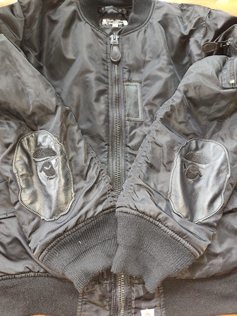 Mastermind Japan x A Bathing Ape Bomber Jacket (Category: Coats, Jackets and Outerwear) located in Manila. Submitted by truefish-1928 (Listing ID 1464137010, Image 2). Description: - Mastermind Japan x A Bathing Ape collaboration bomber jacket. - Features premium leather patches with Bape's signature ape head logo on the sleeves. - Striking large skull and crossbones design prominently displayed on the back. - Comfortable ribbed cuffs and collar 