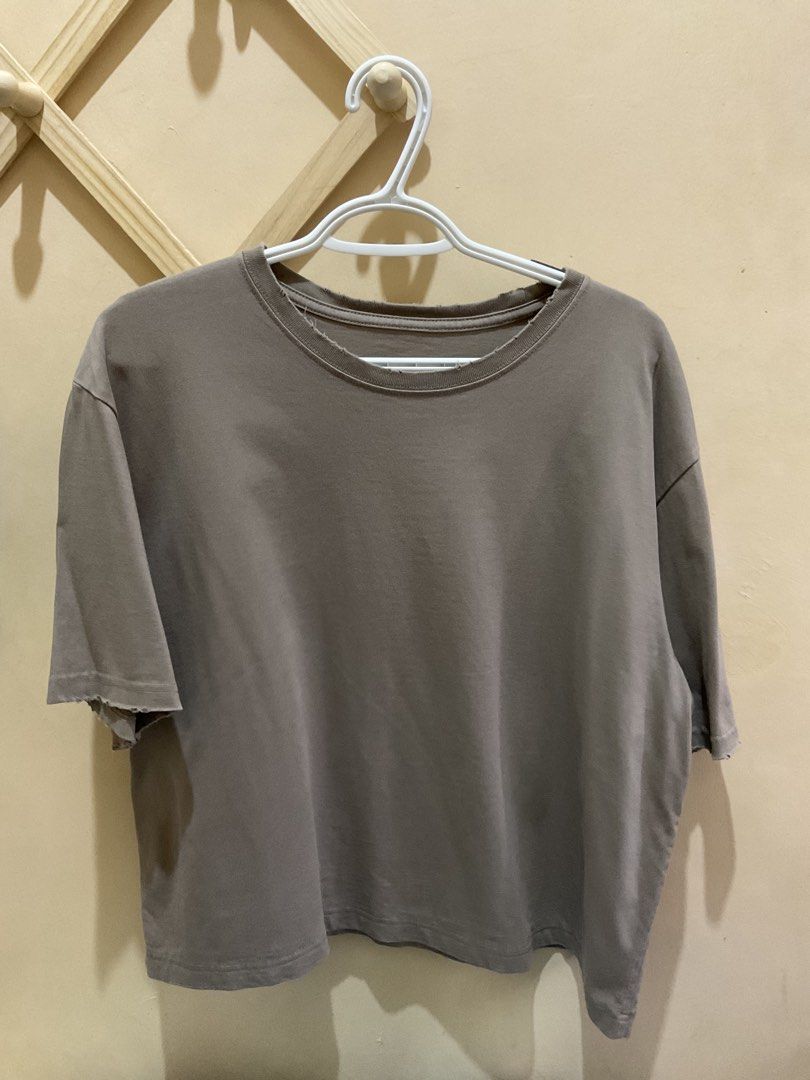 Matin Kim Brown Oversized T-shirt (Category: Tshirts & Polo Shirts ) located in Antipolo. Submitted by declutterbymojooo (Listing ID 1463972743, Image 2). Description: - Oversized fit - Distressed details on collar and sleeves -cropped length about 23-25 inches.