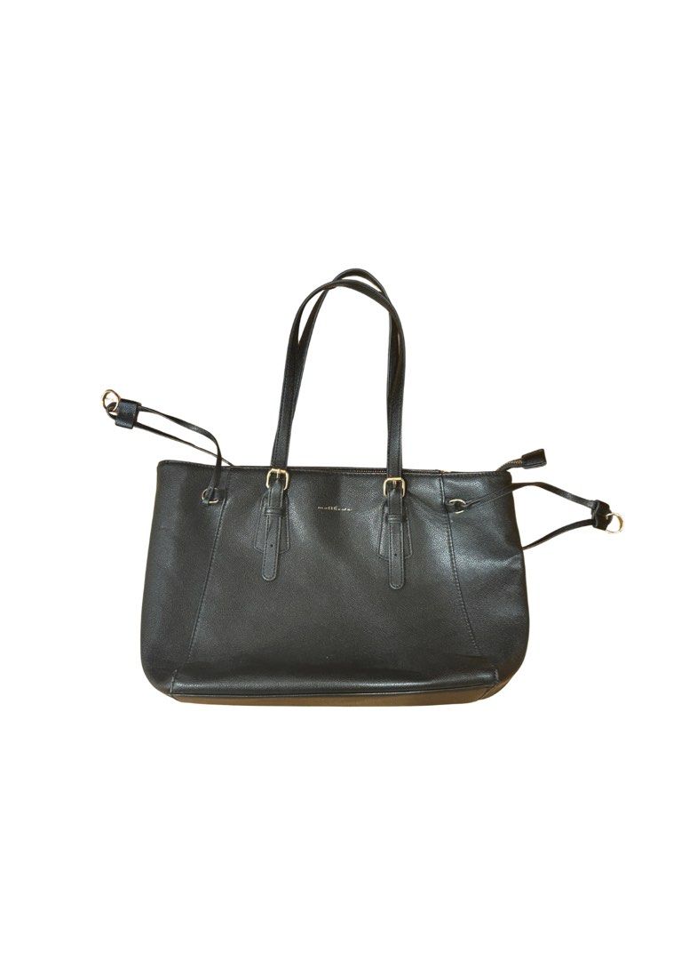 Matthews Black Tote Bag (Category: Tote Bags) located in Imus. Submitted by zenstorm-205c (Listing ID 1464027697, Image 1). Description: Originally bought for P3,500 Has marks but can be cleaned Can fit a 13-inch macbook air.