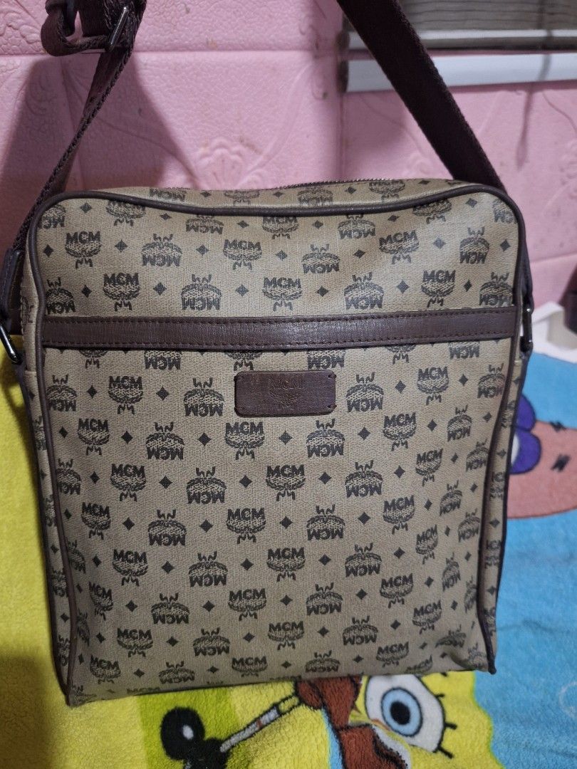 MCM Monogram Crossbody Bag (Category: Luxury Bags & Wallets) located in Quezon City. Submitted by cloudymay (Listing ID 1464111556, Image 1). Description: - Authentic Classic MCM crossbody bag - Signature all-over monogram pattern - Brown leather trim and strap - Zipper closure - Perfect for everyday essentials - Piping issue on 1 corner, but fixed already.