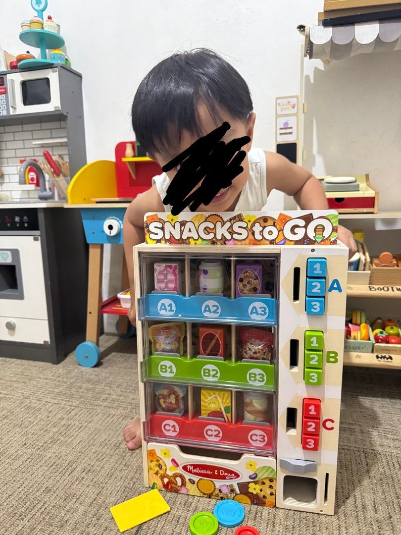 Melissa & Doug Snacks to Go Vending Machine Play Set (Category: Kids Toys) located in Bacoor. Submitted by karlarmrz (Listing ID 1464000833, Image 3). Description: - Fun vending machine play set from Melissa & Doug - Includes 19 pieces for pretend play - Kids can sort and select pretend snacks - Comes with pretend snacks and coins - Encourages imaginative play and learning - Award-winning toy Early Christmas Gift Idea 💗 PRE-ORDER: M&D Vending Ma