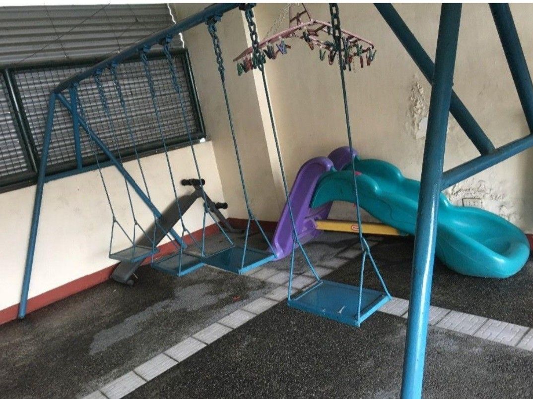 Metal swing (Category: Kids Toys) located in Bulacan. Submitted by rks.rks (Listing ID 1463987511, Image 2). Description: - Blue metal swing set - Great for outdoor fun and active play - Shows some signs of wear on the metal frame - Chains are sturdy and reliable - Ready for a new home and more adventures!.