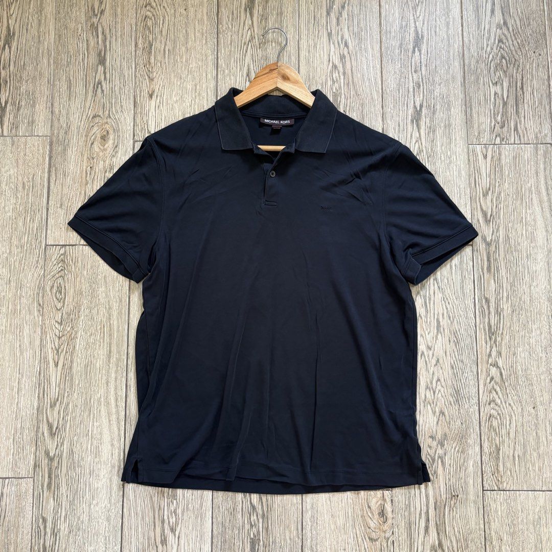 Michael Kors Black Polo Shirt (Category: Tshirts & Polo Shirts ) located in Imus. Submitted by reloved.nd (Listing ID 1464074348, Image 1). Description: .