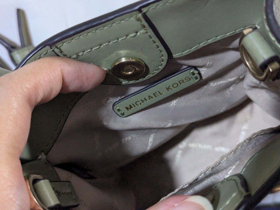 Michael Kors Green Leather Mini Tote Bag (Category: Luxury Bags & Wallets) located in Quezon City. Submitted by kuripotnya (Listing ID 1464059936, Image 3). Description: - Authentic Michael Kors mini tote bag - Color: Green - Material: Pebbled leather - Hardware: Gold details -preloved excellent condition 10/10 - Includes: Detachable crossbody strap - Interior: MK logo lining - Dimensions: Approx. 6" W x 7" H - Ideal for carrying essentials.
