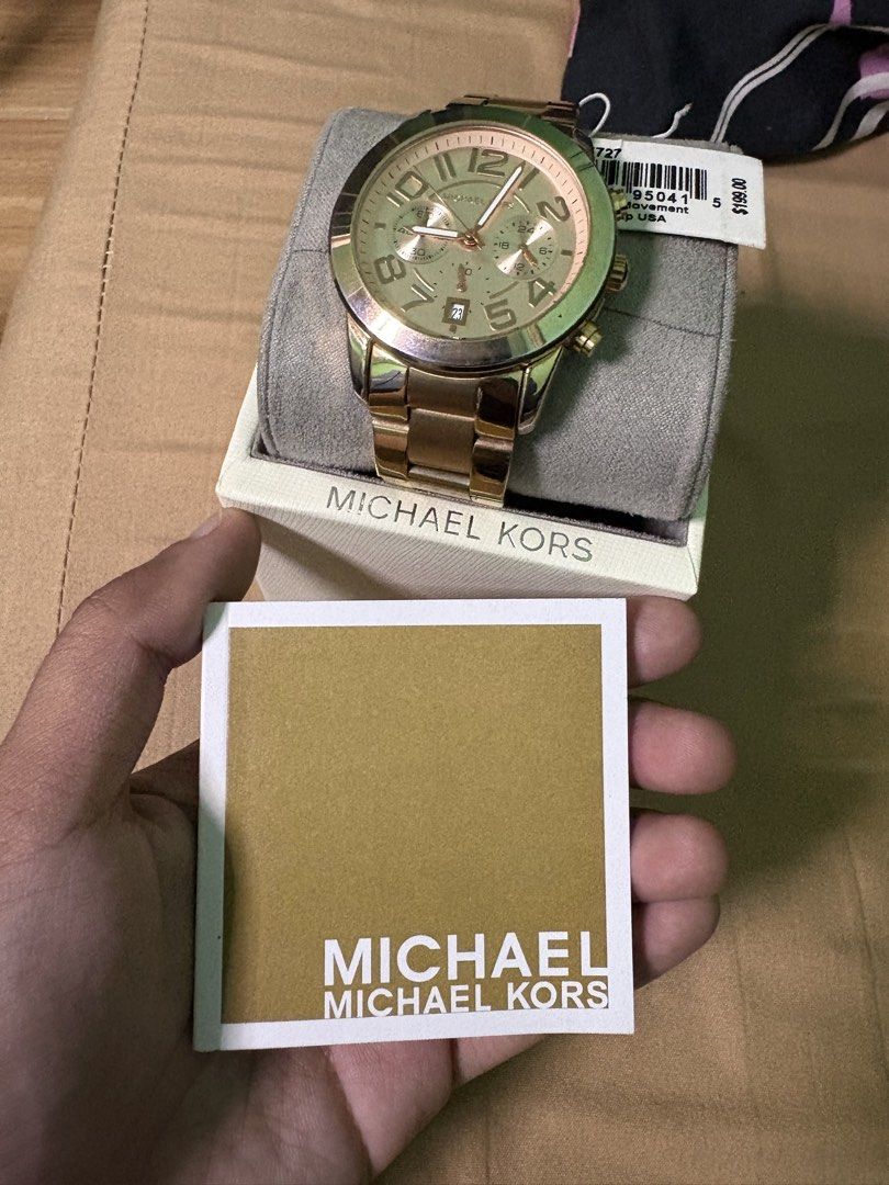 Michael Kors Rose Gold Chronograph Watch (Category: Women's Watches) located in Manila. Submitted by ezel88753 (Listing ID 1463942700, Image 2). Description: - Rose gold Michael Kors watch - Chronograph function with date display - Includes original box and tag - Reliable Japanese movement - Versatile for everyday or special occasions.