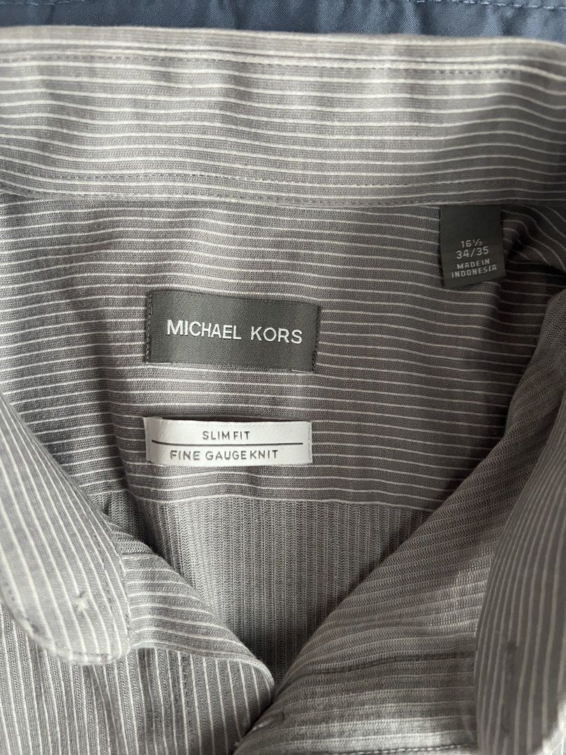 Michael Kors Striped Shirt Long Sleeve (Category: Formal Shirts) located in Muntinlupa City. Submitted by coolthrifto (Listing ID 1463976038, Image 2). Description: Issue: none Length: 29.5 - 31 Width: 21 Authentic.