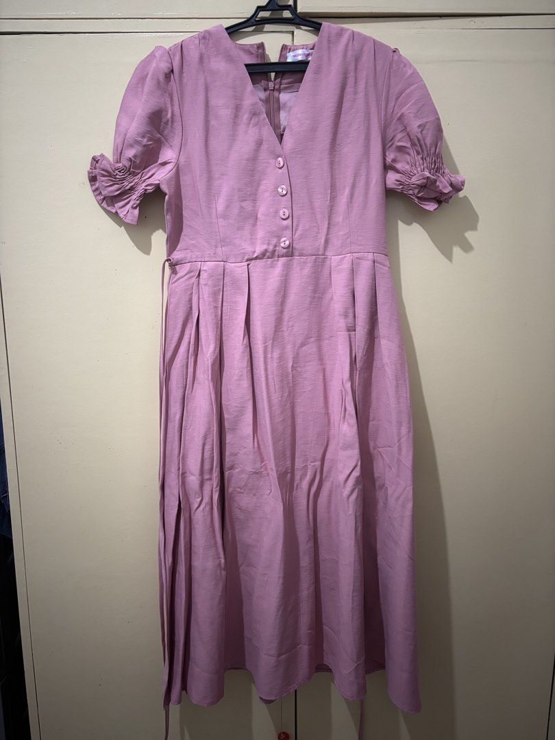 Milkshake Pink Puff Sleeve Button Front Midi Dress (Category: Dresses) located in Cavite. Submitted by 1renek (Listing ID 1464091811, Image 1). Description: Cute pink midi dress. Puff sleeves with ruffled cuffs. Button front detail. Has a tie at the side. Perfect for casual outings or dressing up. Original tag still attached. MOD: Lalamove (Cavite Area), JNT MOP: GCASH MOD: Lalamove (Cavite Area), JNT MOP: GCASH.