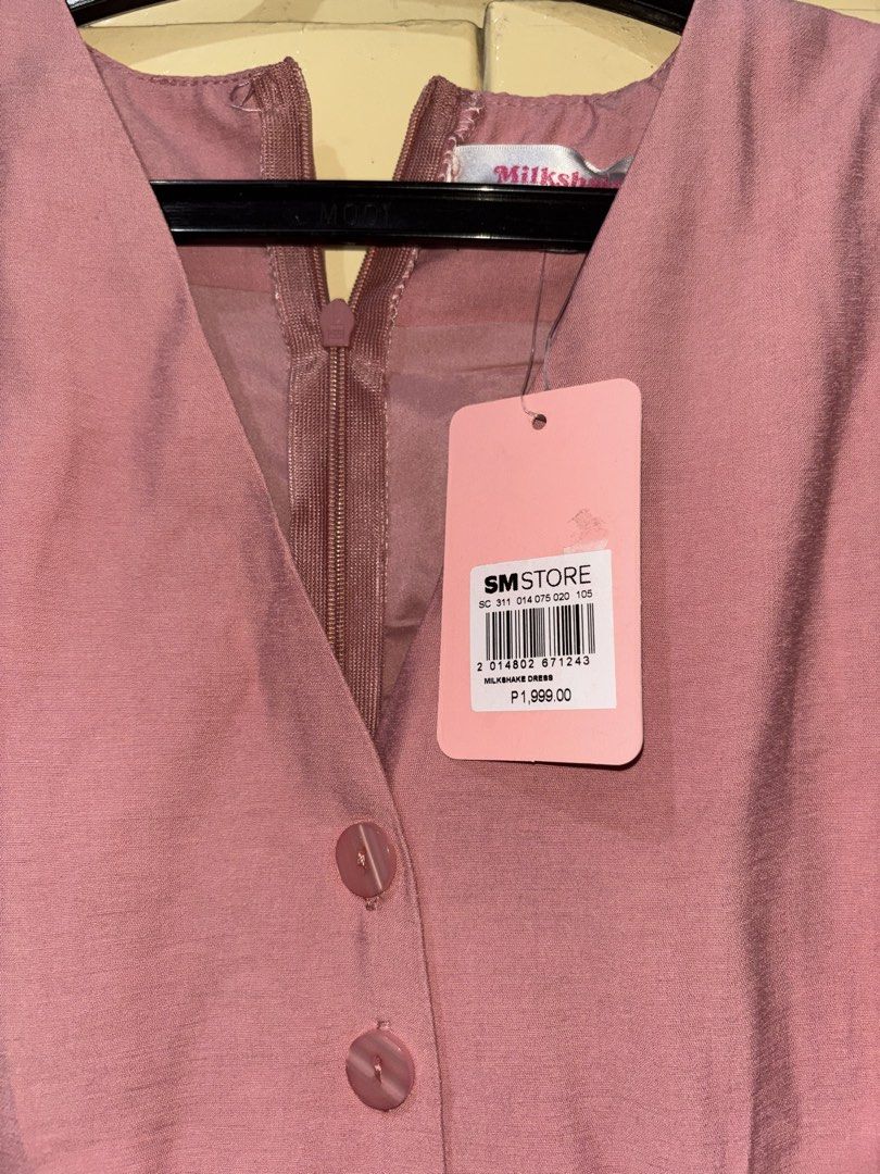 Milkshake Pink Puff Sleeve Button Front Midi Dress (Category: Dresses) located in Cavite. Submitted by 1renek (Listing ID 1464091811, Image 3). Description: Cute pink midi dress. Puff sleeves with ruffled cuffs. Button front detail. Has a tie at the side. Perfect for casual outings or dressing up. Original tag still attached. MOD: Lalamove (Cavite Area), JNT MOP: GCASH MOD: Lalamove (Cavite Area), JNT MOP: GCASH.