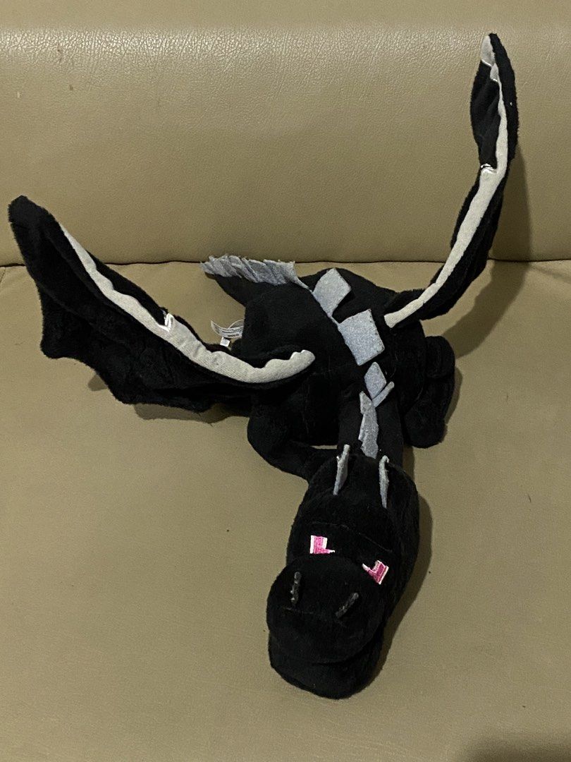 Minecraft Ender Dragon Plush Toy (Category: Plushies & Soft Toys) located in Davao. Submitted by hoowans_surplus (Listing ID 1463953670, Image 1). Description: - Adorable black dragon plush toy - Video game-inspired design - Features wings and a long tail - Super soft and cuddly - Ideal for dragon and gaming fans - Approximate size: [insert length here if known].