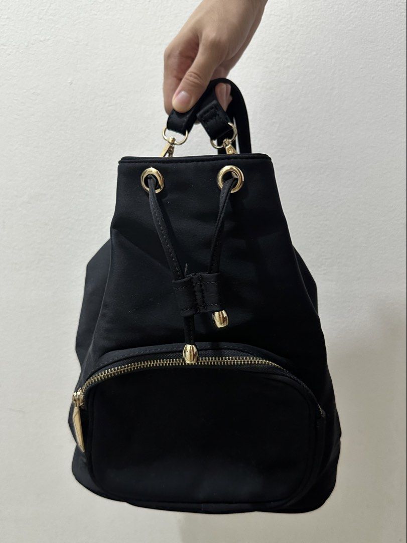 Mini Black Drawstring Bag (Category: Backpacks) located in Paranaque City. Submitted by preloveeed890 (Listing ID 1464050723, Image 1). Description: .
