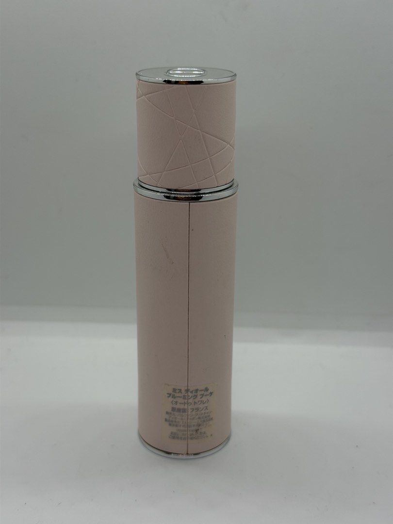Miss Dior Blooming Bouquet Refill Atomizer (Category: Fragrance & Deodorants) located in Mandaluyong City. Submitted by elle_scent (Listing ID 1463944908, Image 2). Description: Condition: Pre-owned / partially used • Original Dior travel-size spray bottle with original case • Please see photos for the actual fill level and condition • Bottle and case show some signs of storage/age/wear • Important: The outer case has some scratches/marks, as sho