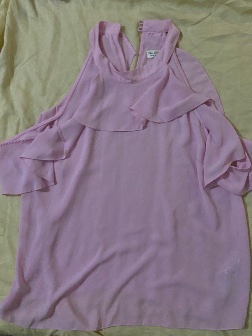 Miss Selfridge Pink Ruffle Cold Shoulder Top (Category: Sleeveless) located in Makati City. Submitted by dinhermoso (Listing ID 1464121320, Image 1). Description: - Adorable pink top - Features charming ruffle details on the front - Stylish cold shoulder sleeves - Convenient tie-up detail at the back of the neck - Made from lightweight material, ideal for hot weather - Versatile for dressing up or down - Missing 1 button.