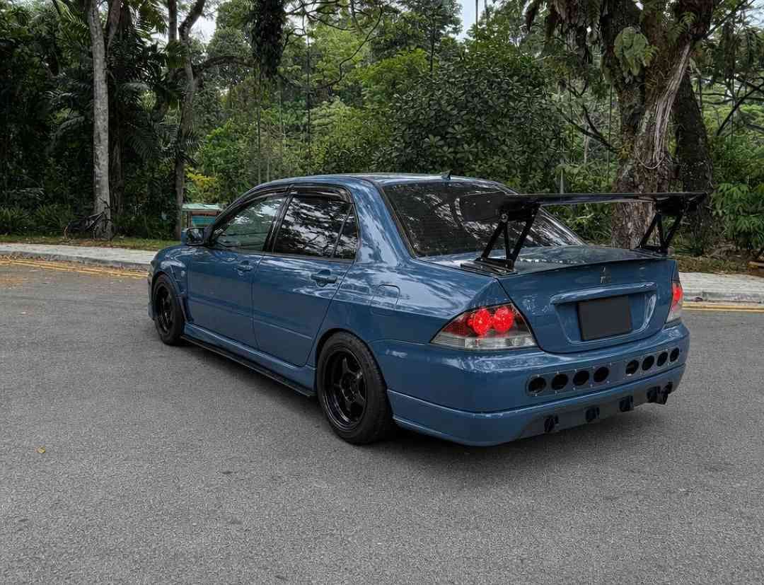 Mitsubishi Lancer 1.6 GLX (M) (Category: Used Cars) located in Singapore. Submitted by carousell_certified_partners (Listing ID 1464013288, Image 3). Description: Relatively stock in immaculate condition unit with minor accessories tastefully done up by owner! Rare ralliart recaro seats! Excellent car with manual power with simota closed pod intake! Spacious enough for daily driving without sacrificing on power for overtaking! Flexible financing 