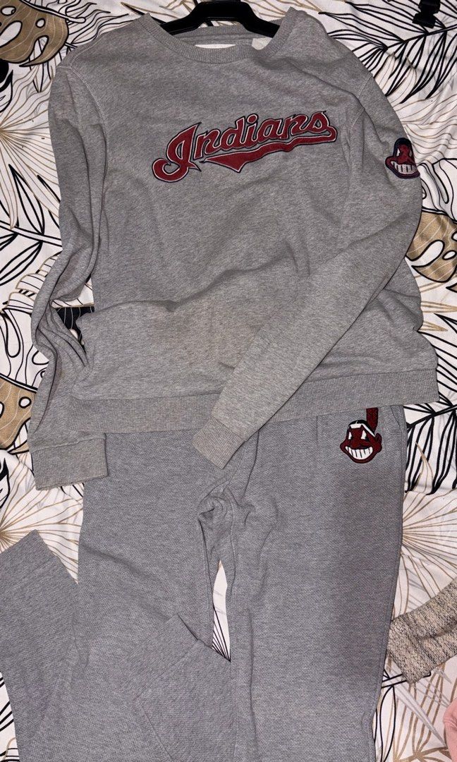 MLB Cleveland Indians Grey Sweatshirt & Pants Set (Category: Coats, Jackets and Outerwear) located in Manila. Submitted by keenfox-84bb (Listing ID 1464025061, Image 2). Description: - Grey MLB Cleveland Indians sweatshirt and matching pants set. - Features the official Cleveland Indians logo on the sweatshirt chest and sleeve. - Pants include the team logo on the left leg. - Comfortable for lounging or casual wear. - Ideal gift for any baseball 