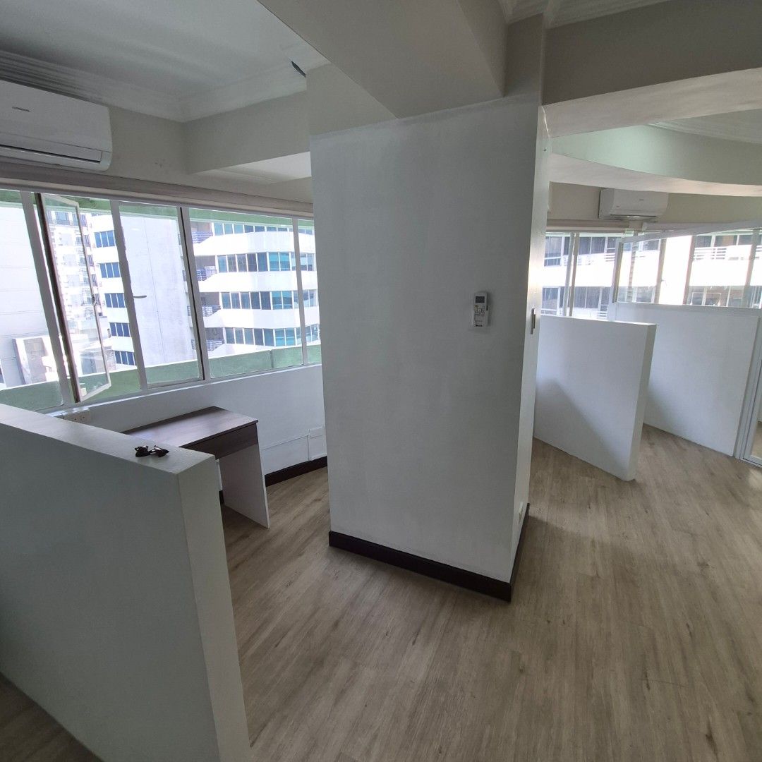 Modern Office Space for rent (Category: Commercial) located in Caloocan City. Submitted by lermaacosta (Listing ID 1464132980, Image 3). Description: Exclusive of assoc dues 83000 - Modern office setup - Sleek reception desk with wood slat accents and built-in aquarium - with conference room - with 5 cubicles - Clean, contemporary feel with light wood flooring and white walls - Include 4 air conditioning unit - Ideal for a professional office env
