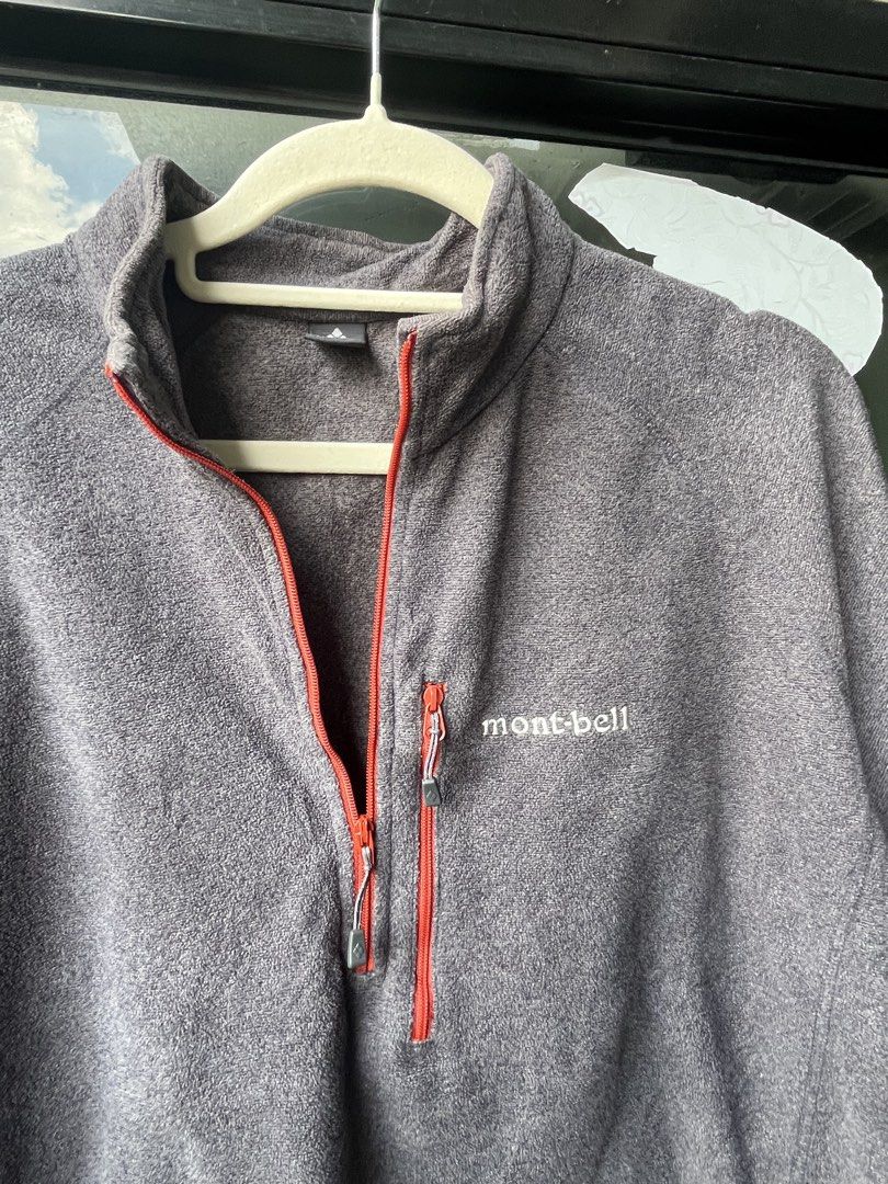 Montbell Grey Fleece 1/4 Zip Pullover Sweater Size M (Category: Coats, Jackets and Outerwear) located in Manila. Submitted by kingjamessthriftt (Listing ID 1464005519, Image 2). Description: - Montbell Fleece Pullover - Color: Grey with red zipper accents - Size: Medium (M) - Features a zippered chest pocket - Ideal for layering or standalone wear - Made in Vietnam.