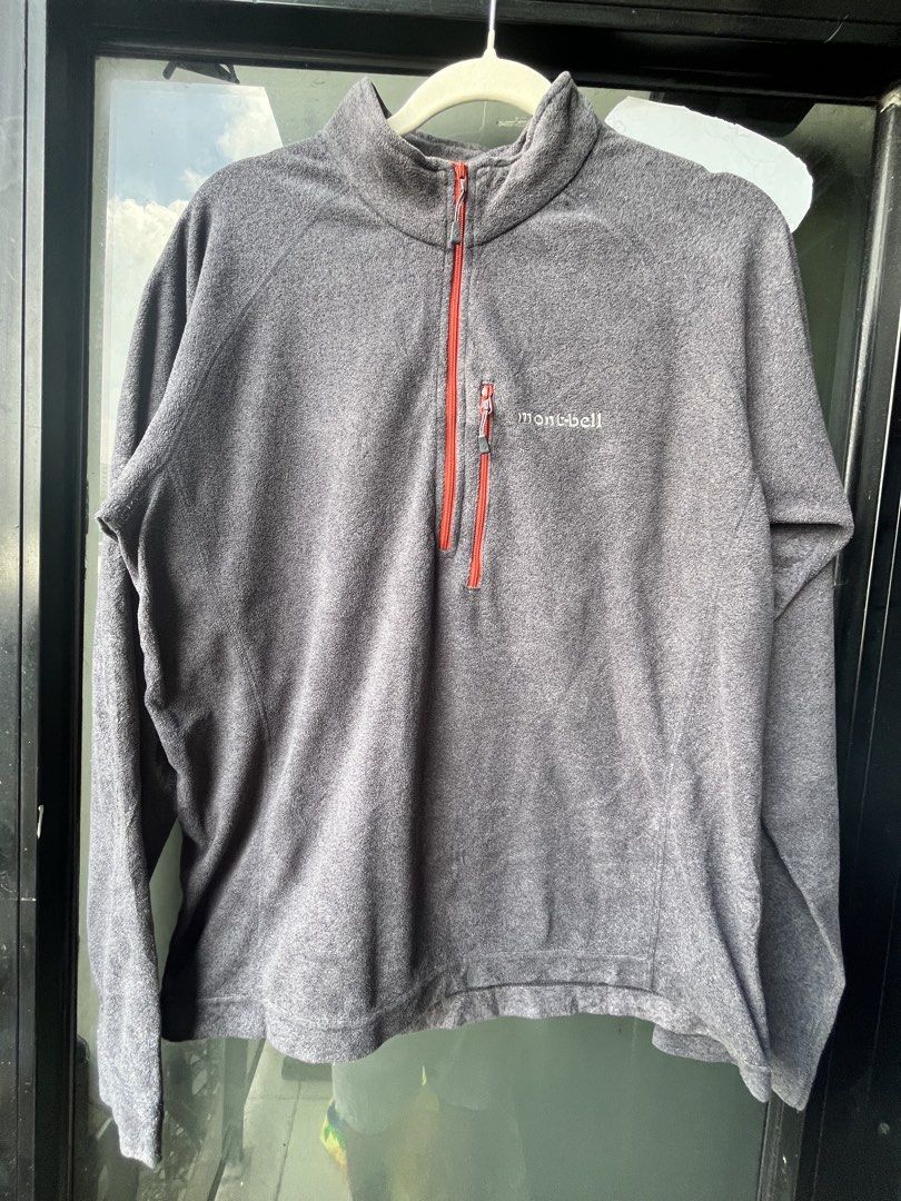 Montbell Grey Fleece 1/4 Zip Pullover Sweater Size M (Category: Coats, Jackets and Outerwear) located in Manila. Submitted by kingjamessthriftt (Listing ID 1464005519, Image 1). Description: - Montbell Fleece Pullover - Color: Grey with red zipper accents - Size: Medium (M) - Features a zippered chest pocket - Ideal for layering or standalone wear - Made in Vietnam.