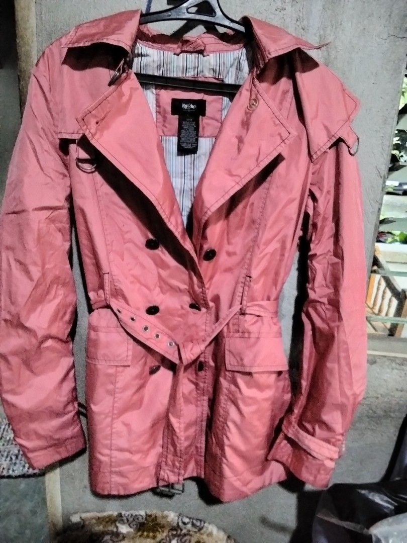 Mossimo Pink Double-Breasted Trench Coat (Category: Coats, Jackets and Outerwear) located in Indang. Submitted by swiftowl_a40469 (Listing ID 1464125967, Image 2). Description: Cute pink trench coat from Mossimo. Double-breasted style with a belt to cinch the waist. Has a striped lining inside. Great for layering over outfits..