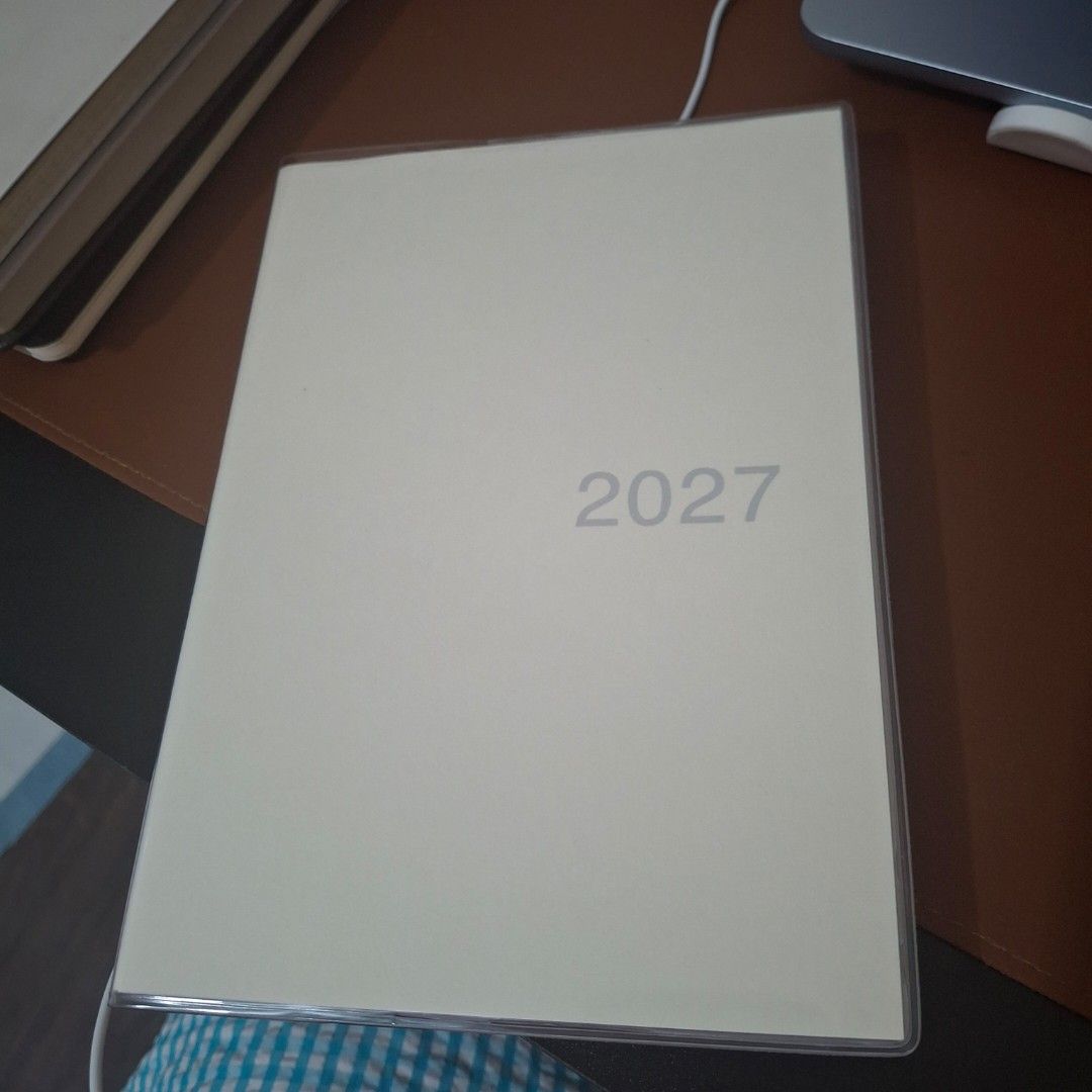 Muji 2027 Planner (Category: Stationery & School Supplies) located in Makati City. Submitted by ajrdls (Listing ID 1464080059, Image 1). Description: Muji 2027 Planner (B6) - view-at-once, monthly/weekly planner - bought for 590 original price from muji store -mint condition, was never used. - last pic is a size comparisson (A5 - left, B6 - right) - rfs: i want a different layout + different size and color for sale priced at: 500 nlng BUT OPEN FO
