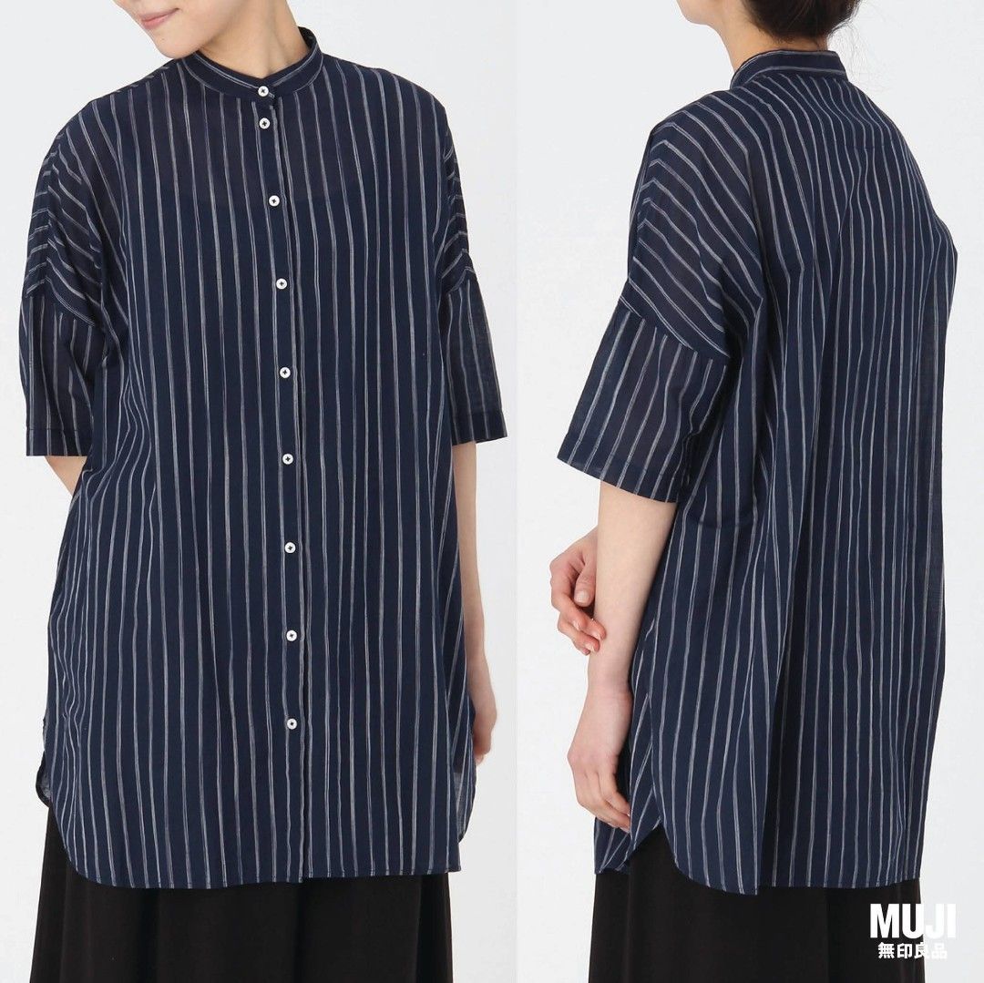 MUJI Navy Stripe Stand Collar Tunic Shirt (Category: Blouses) located in Davao. Submitted by parenasnic86577 (Listing ID 1463938921, Image 3). Description: - Navy blue tunic shirt - White vertical stripes - Stand collar - Button-up front - Short sleeves - Relaxed fit - Brand: MUJI - Ideal for casual wear - Comfy and stylish.
