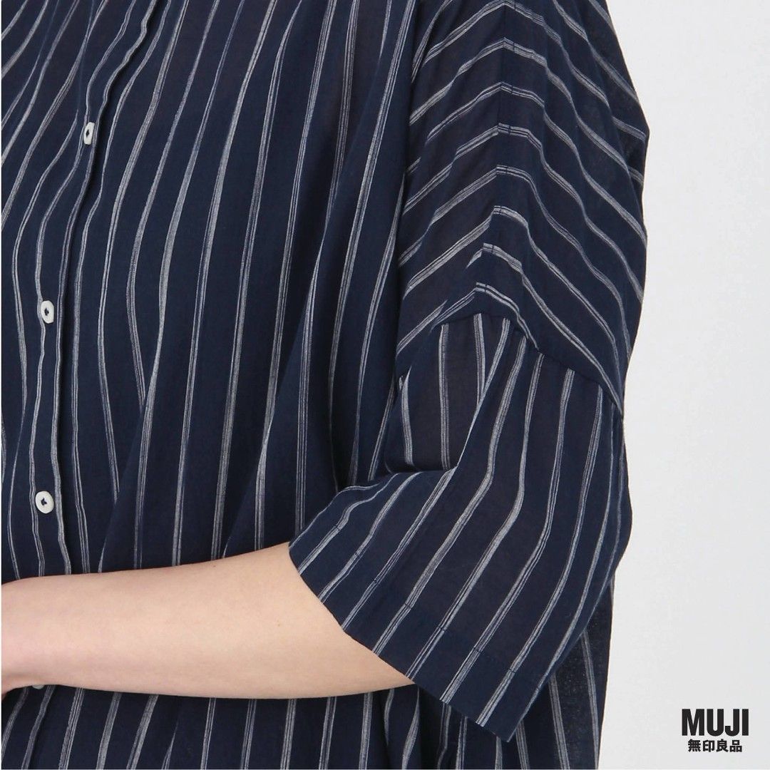 MUJI Navy Stripe Stand Collar Tunic Shirt (Category: Blouses) located in Davao. Submitted by parenasnic86577 (Listing ID 1463938921, Image 2). Description: - Navy blue tunic shirt - White vertical stripes - Stand collar - Button-up front - Short sleeves - Relaxed fit - Brand: MUJI - Ideal for casual wear - Comfy and stylish.