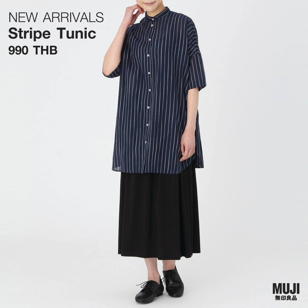 MUJI Navy Stripe Stand Collar Tunic Shirt (Category: Blouses) located in Davao. Submitted by parenasnic86577 (Listing ID 1463938921, Image 1). Description: - Navy blue tunic shirt - White vertical stripes - Stand collar - Button-up front - Short sleeves - Relaxed fit - Brand: MUJI - Ideal for casual wear - Comfy and stylish.