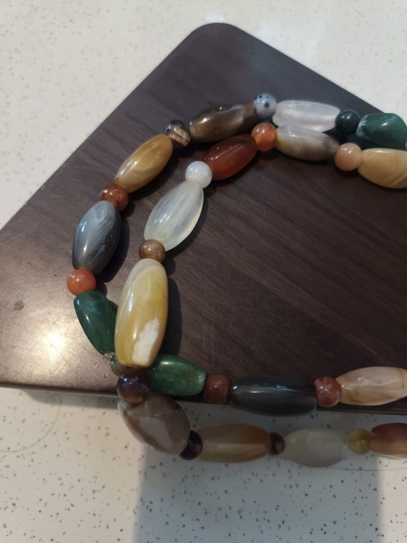 Multi-color Agate Natural Stone (Category: Necklaces) located in Santa Rosa. Submitted by rare_findsphbyleo (Listing ID 1463969899, Image 3). Description: - Vintage Agate stone - Features a mix semi precious stone. green, white, orange, brown, and grey 28 inches end to end japan.