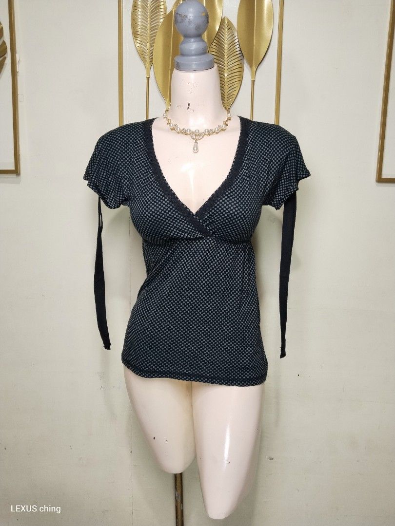 NAFNAFNAF micro polka dot Vneck top a lace trim. (Category: Dresses) located in Manila. Submitted by lexusthrift1995 (Listing ID 1464056156, Image 1). Description: Size- MEDIUM on tag but fit to XS to SMALL Dimension- 14/15x21.5 Color rate- 9/10 Condition- 9/10 issue- no issue good condition ‼️200.pesos plus shipping fee 💸MODE OF PAYMENT- GCASH payment first 🚛MODE OF DELIVERY- J&T or LALAMOVE 📍LOCATION- NORTH CALOOCAN CAMARIN BRGY.177 1705 SUN