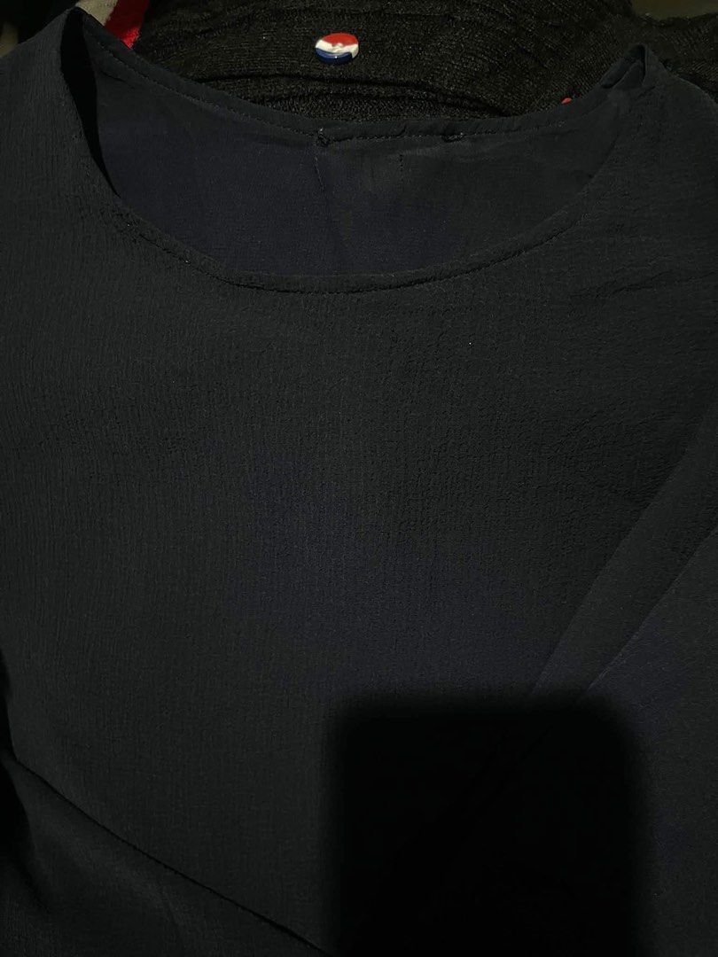 UNIQLO Navy Blue Flutter Sleeve Top (Category: Blouses) located in Donsol. Submitted by saksthriftavenuebyluckymaria8 (Listing ID 1463969491, Image 3). Description: - Navy blue top - Textured fabric - Flutter sleeves - Round neckline - Comfortable and flowy fit - Perfect for dressing up or down Uniqlo navy blue dress flutter sleeves minimalist top sz L chest 22 in ilength 25in armhole 11 in Shoulder l6 in.