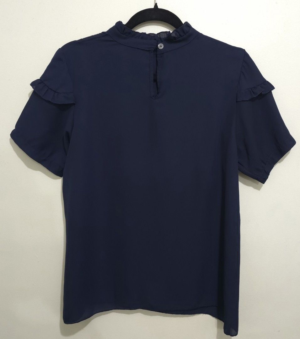 Navy Blue Ruffle Mock Neck Short Sleeve Blouse (Category: Blouses) located in Las Pinas. Submitted by monmonish (Listing ID 1464059668, Image 2). Description: Chiffon Blouse No flaws Size: Small.