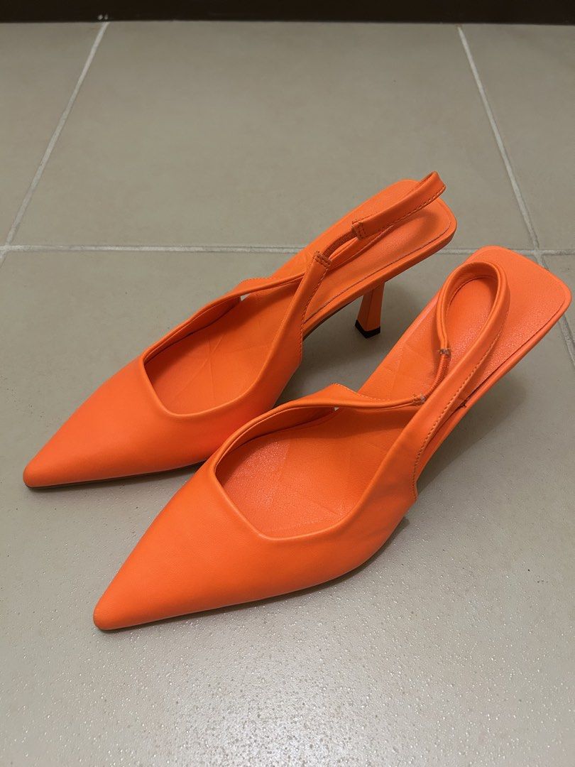 Neon Orange Pointed Toe Heels (Category: Heels) located in Pasig City. Submitted by hobidoki (Listing ID 1464069229, Image 1). Description: Bought on Shein Used twice for an event LOC: Kapitolyo, Pasig City MOP: GCASH MOD: c/o Buyer.
