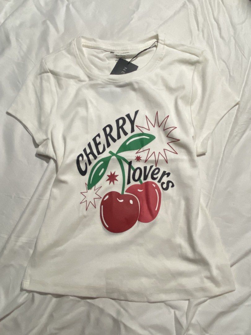 NEW LOOK Cherry lovers Top (Category: Shirts) located in Pasig City. Submitted by aeclosetco (Listing ID 1463939187, Image 1). Description: Location: Santolan Pasig City Mode of Payment - Gcash Mode of Shipment - JnT - Lalamove Notes: - Shipping fee is to be shouldered by the customer. Rules: - No Downpayment = No Reservation - Payment First - No COD - No cancellation once the order is confirmed - All Bogus/Joyjoy miner will be posted.