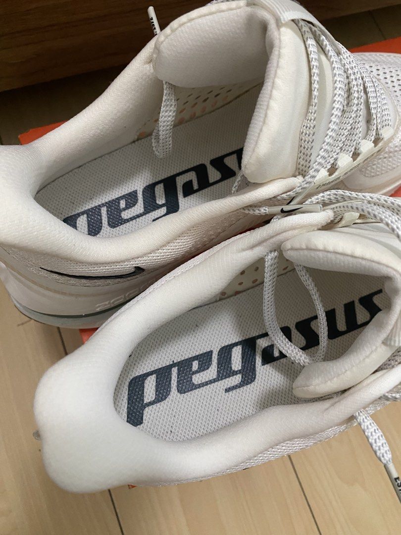 Nike Air Zoom Pegasus Premium Ivory (Category: Sneakers) located in Manila. Submitted by olxph_808966171 (Listing ID 1463951719, Image 3). Description: White Nike Air Zoom Pegasus running shoes. Lightweight, breathable, and cushioned for training or everyday wear. Includes original box..