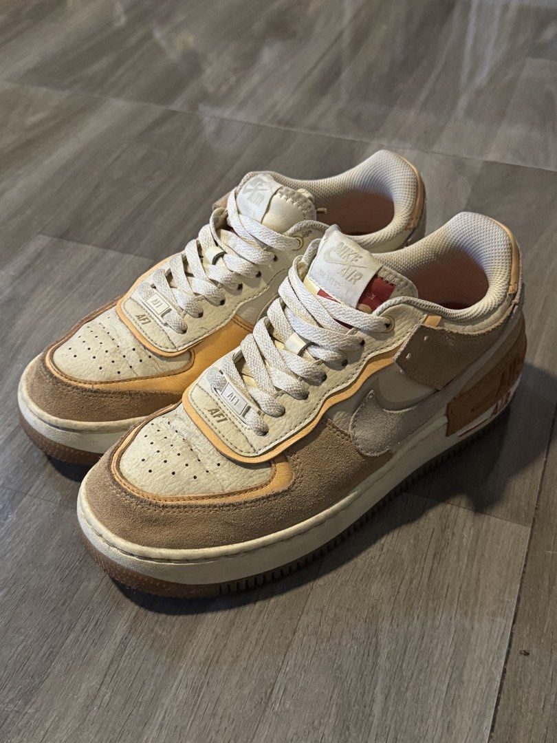 Nike Airforce 1 Sisterhood Shadow (Category: Sneakers) located in Muntinlupa City. Submitted by stuffdcloset (Listing ID 1463966024, Image 1). Description: - US W 8.5 - Bought in the US for $120 - Nike Air Force 1 Shadow sneakers - Beige and orange colorway - Suede and leather accents - Lightly used, but needs cleaning.